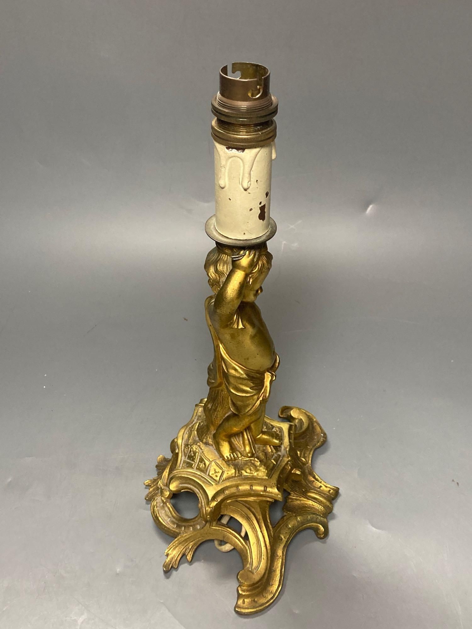 A 19th century ormolu figural lamp stem, 21cm excluding light fitting